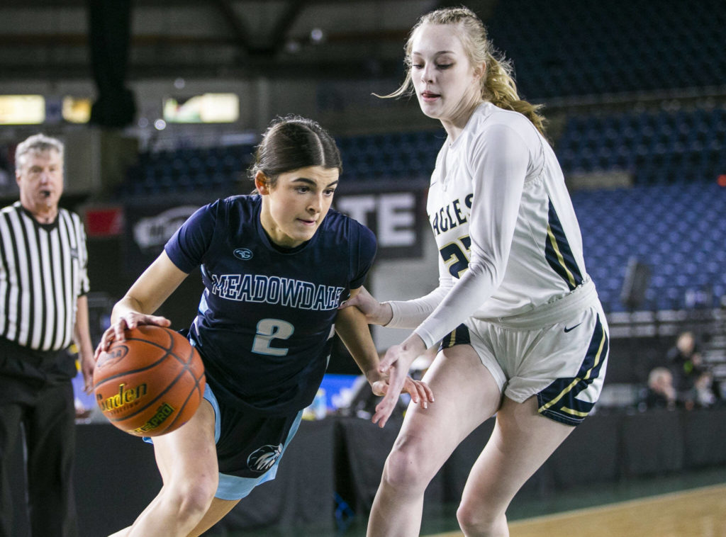 Meadowdale’s Gia Powel drives to the hoop during the 3A quarterfinal game against Arlington on Thursday, March 2, 2023 in Tacoma, Washington. (Olivia Vanni / The Herald)
