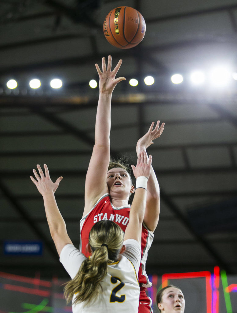 Stanwood’s Vivienne Berrett makes a jump shot during the 3A quarterfinal game against Mead on Thursday, March 2, 2023 in Tacoma, Washington. (Olivia Vanni / The Herald)
