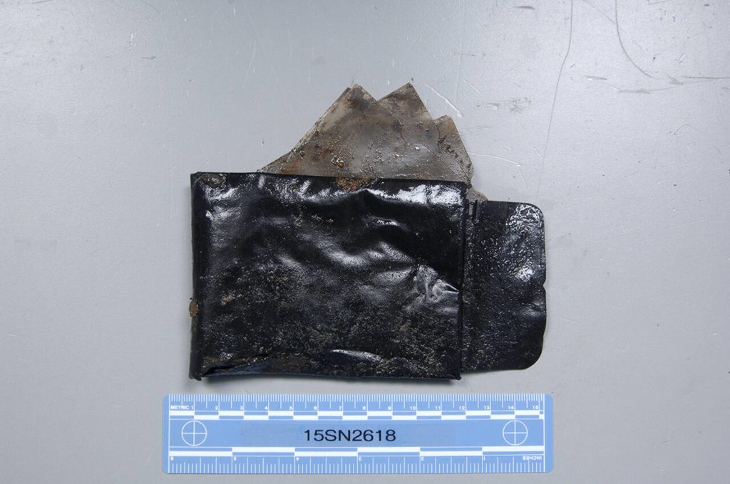 Gary Lee Haynie’s leather wallet withstood tides and almost four decades in a grave. But if there was anything inside like a driver’s license, or cash it had deteriorated by Jan. 3, 1979. (Snohomish County Medical Examiner’s Office)
