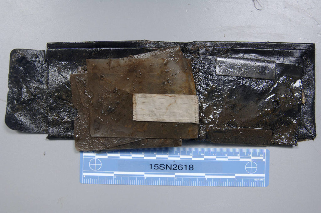 Gary Lee Haynie’s leather wallet withstood tides and almost four decades in a grave. But if there was anything inside like a driver’s license, or cash it had deteriorated by Jan. 3, 1979. (Snohomish County Medical Examiner’s Office)
