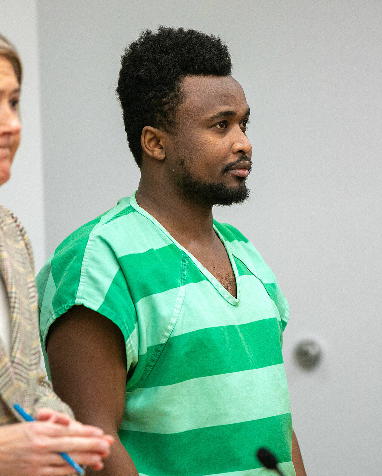 Kelvin Njeru appears in court for sentencing on Tuesday, March 7, 2023, at Snohomish County Superior Court in Everett, Washington. (Ryan Berry / The Herald)
