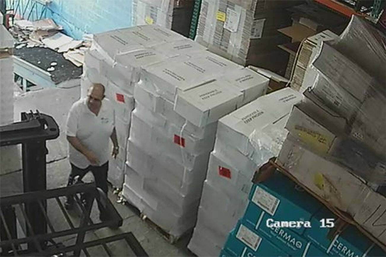 A still photograph taken from the surveillance cameras at Jomara Seafood in Miami, Florida, allegedly depict David Subil after selling stolen crab. (Western District Court of Seattle)