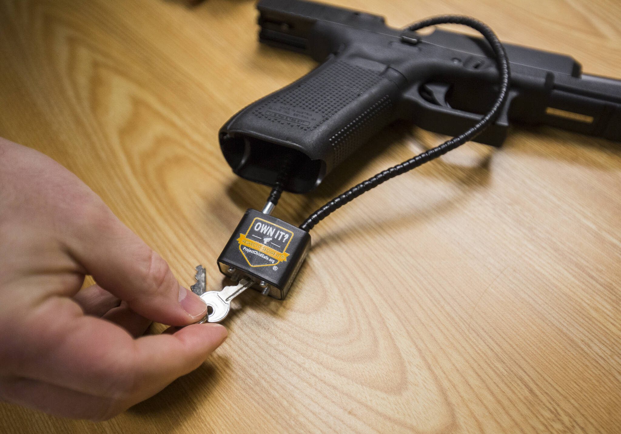 A Project Child Safe gun lock that is available at the Everett Police Department on Thursday, March 12, 2020 in Everett, Washington. (Olivia Vanni / The Herald)