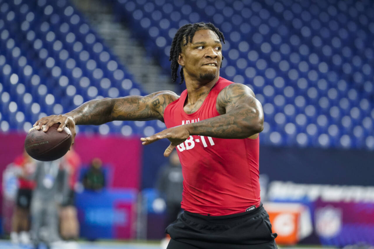 Florida quarterback Anthony Richardson runs a drill at the NFL football scouting combine in Indianapolis, Saturday, March 4, 2023. (AP Photo/Darron Cummings)