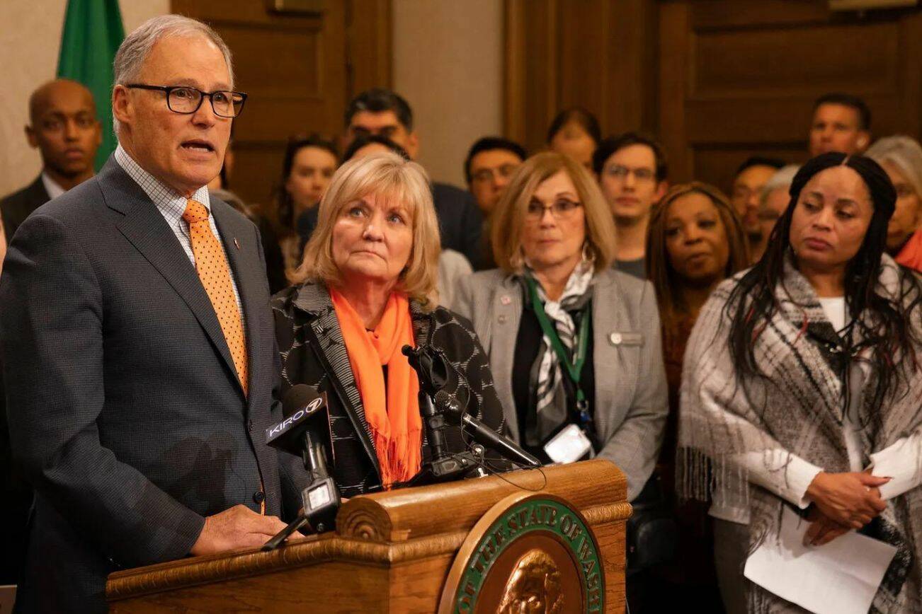 Gov. Inslee, left, with First Lady Trudi Inslee at a press conference advocating for laws to prevent gun violence. (Provided by the Washington State Governors' Office)