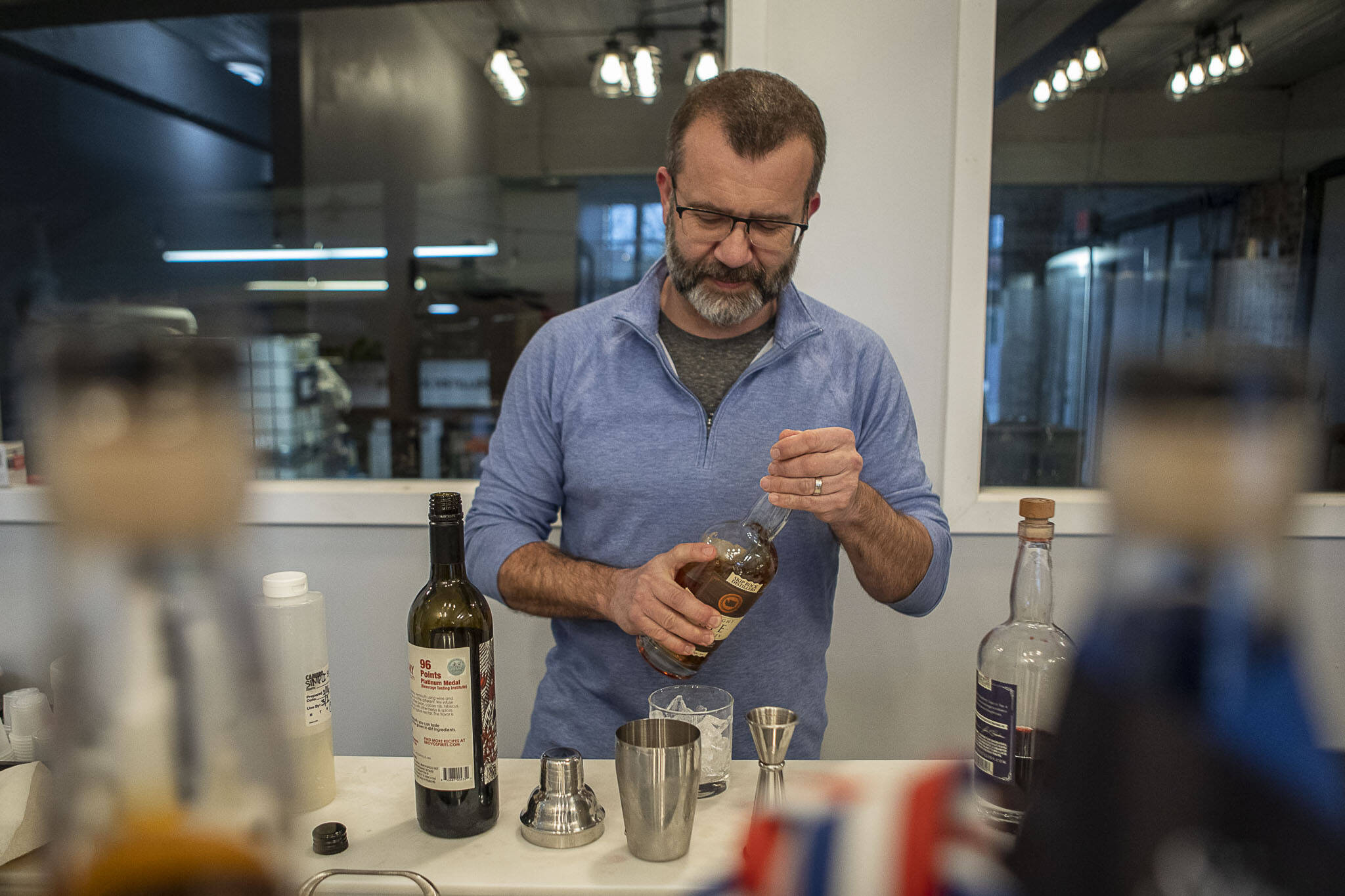 Ryan Hembree prepares a Spring Wish cocktail at Skip Rock Distillers on March 3, 2023 in Snohomish, Washington. Owners Ryan and Julie Hembree recently opened their new remodeled space and will be serving cocktails with their own spirits for the first time. (Annie Barker / The Herald)