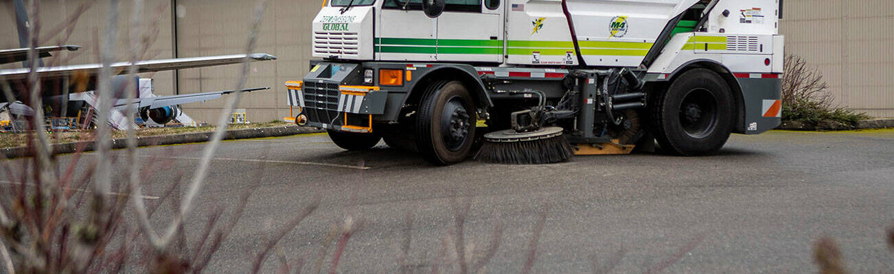 An all-electric street sweeper is displayed at Paine Field in Everett, Washington, on Friday, March 10, 2023. (Annie Barker / The Herald)