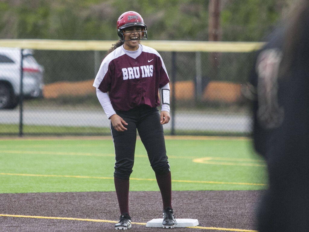 Cascade’s Jaidyn Wilson laughs after hitting a double during the game against Lakewood on Monday, March 13, 2023 in Everett, Washington. (Olivia Vanni / The Herald)
