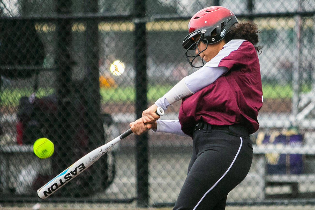 Cascade’s Jaidyn Wilson gets a hit during the game against Lakewood on Monday, March 13, 2023 in Everett, Washington. (Olivia Vanni / The Herald)