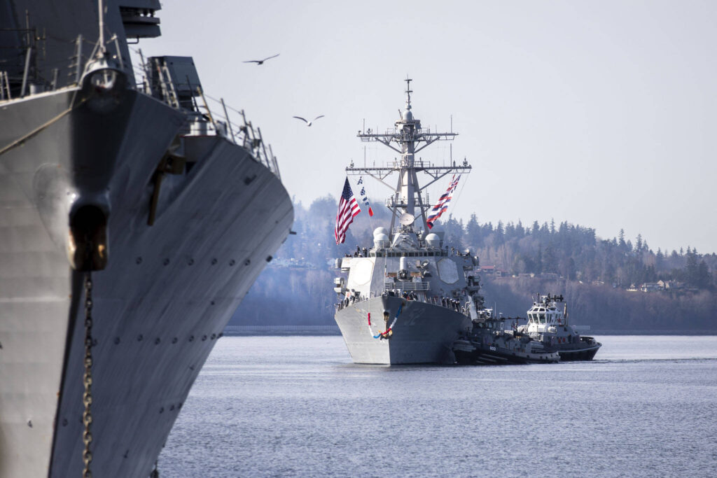 The USS Barry makes its way into port in Everett, Washington on Friday, March 17, 2023. The USS Barry arrived to its new homeport at Everett Naval Station, previously from Yokosuka, Japan. The crew is led by Commanding Officer, Cmdr. Grant Bryan. (Annie Barker / The Herald)
