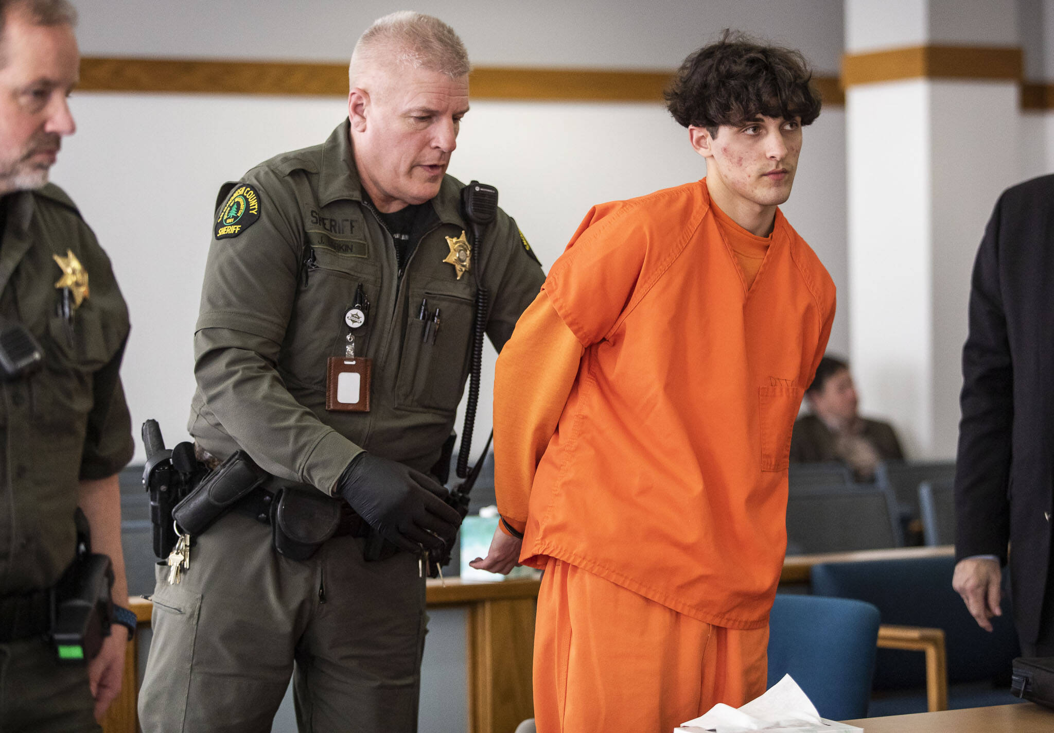 Dominic Wilson is handcuffed Wednesday after his sentencing for the murder of Andre Hofland at the Snohomish County Courthouse in Everett. (Olivia Vanni / The Herald)