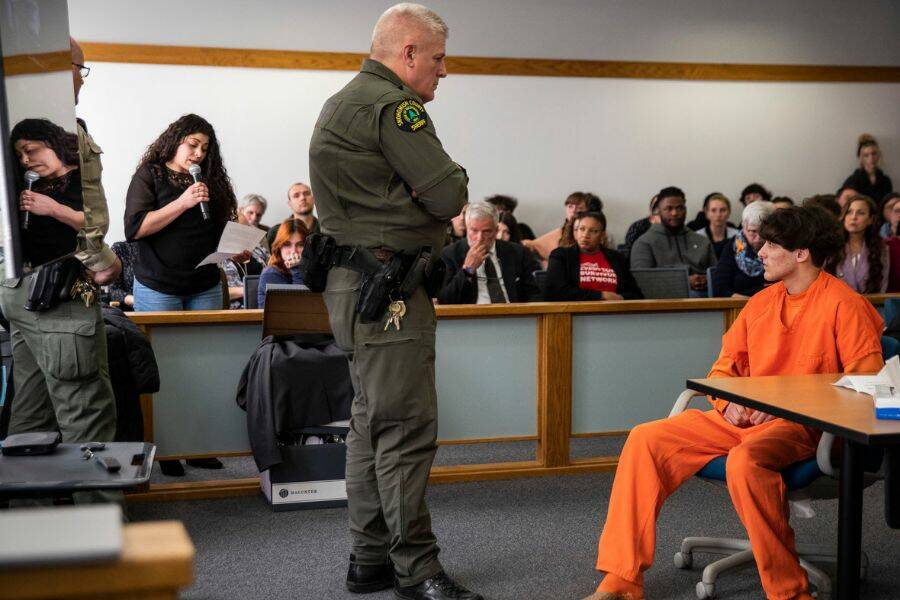 Dominic Wilson looks at his mother while she addresses the court during his sentencing at the Snohomish County Courthouse on Wednesday, March 15, 2023 in Everett, Washington. (Olivia Vanni / The Herald)