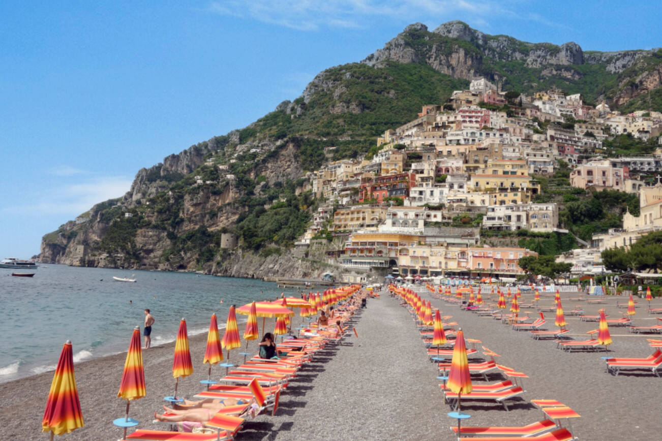 Positano, the jewel of Italy's Amalfi Coast, hugs the rugged shoreline.