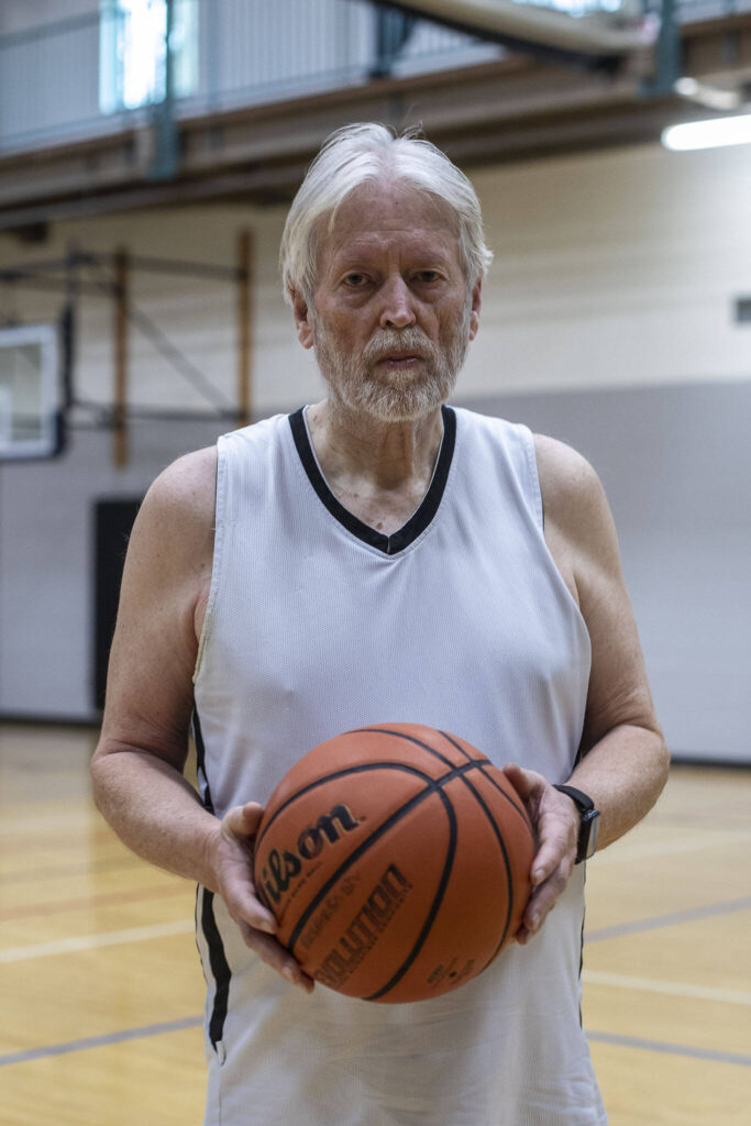 Richard Smith, 74, poses for a photo after a pick-up basketball game at the Marysville YMCA in Marysville, Washington, on Monday, March 13, 2023. (Annie Barker / The Herald)

