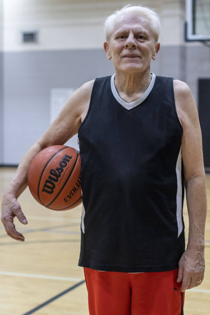 Sal Fonceca, 74, poses for a photo after one of their regular pick-up game of basketball at the Marysville YMCA in Marysville, Washington on Monday, March 13, 2023. (Annie Barker / The Herald)
