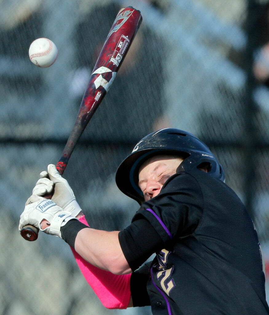 Lake Stevens’ Aspen Alexander gets plunked with a pitch during a game against Lynnwood on Friday, March 17, 2023, at Lake Stevens High School in Lake Stevens, Washington. (Ryan Berry / The Herald)
