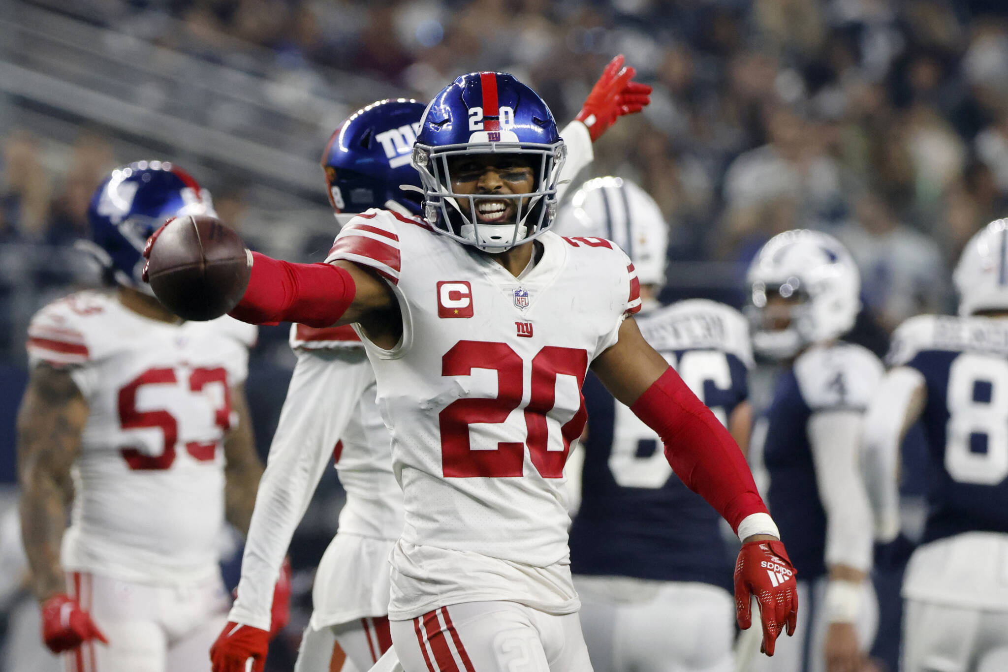 Giants safety Julian Love (20) celebrates after intercepting a pass against the Cowboys during a game on Nov. 24, 2022, in Arlington, Texas. (AP Photo/Michael Ainsworth)