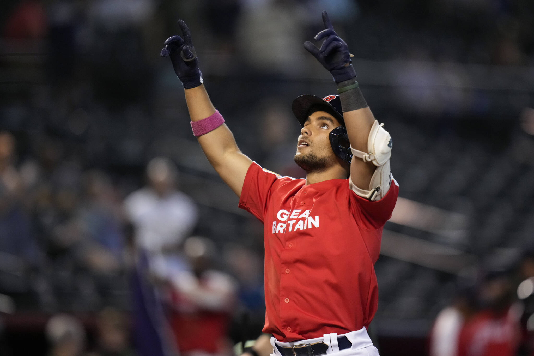 Great Britain’s Harry Ford, a Seattle Mariners prospect, celebrates after hitting a solo home run against Colombia during a World Baseball Classic game in Phoenix on March 13. (AP Photo/Godofredo A. Vásquez)