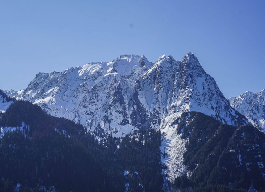 Mount Index covered in snow visible from the Heybrook Ridge Trail on Friday, March 18, 2023, in Index, Washington. (Kayla Dunn / The Herald).
