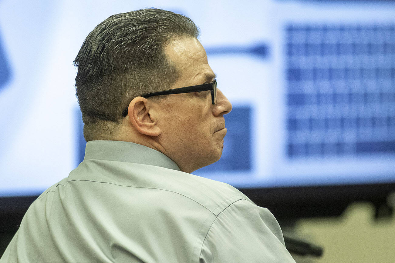 Richard Rotter listens to witness questioning in his trial at the Snohomish County Courthouse in Everett, Washington on Monday, March 20, 2023. (Annie Barker / The Herald)