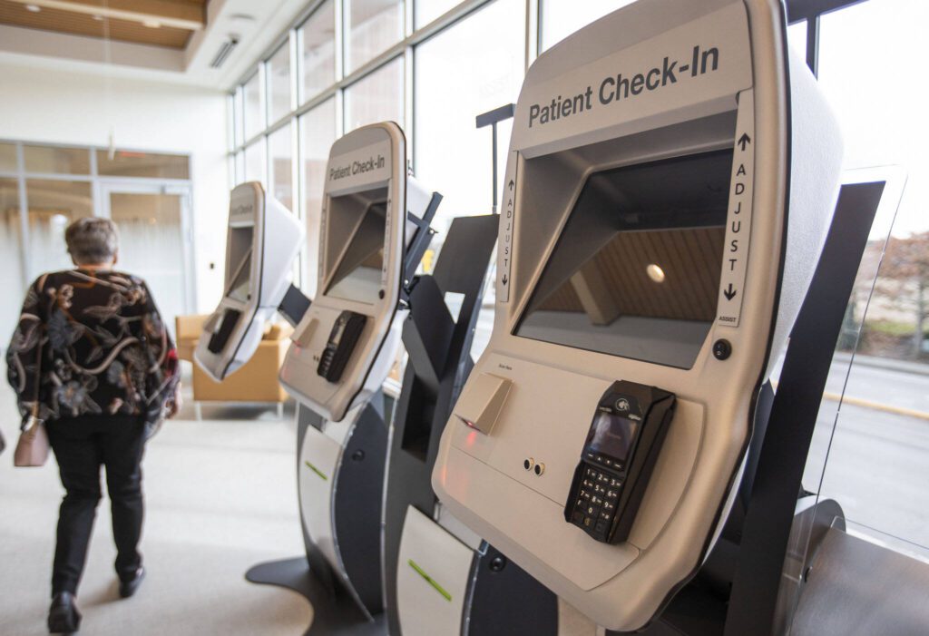 Patient check-in kiosks inside the new Arlington Everett Clinic on Monday, March 27, 2023 in Arlington, Washington. (Olivia Vanni / The Herald)
