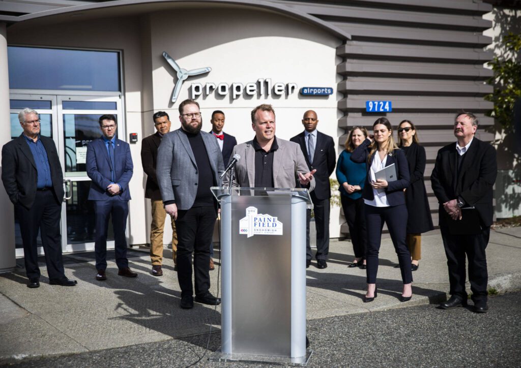 Dr. Joshua Heyne, a leading SAF expert and director of the Bioproducts Science and Engineering Laboratory at WSU Tri-Cities, speaks at a press conference talking about the plan to create the first Sustainable Aviation Fuel Repository in the world at Paine Field on Tuesday, March 28, 2023 in Everett, Washington. (Olivia Vanni / The Herald)
