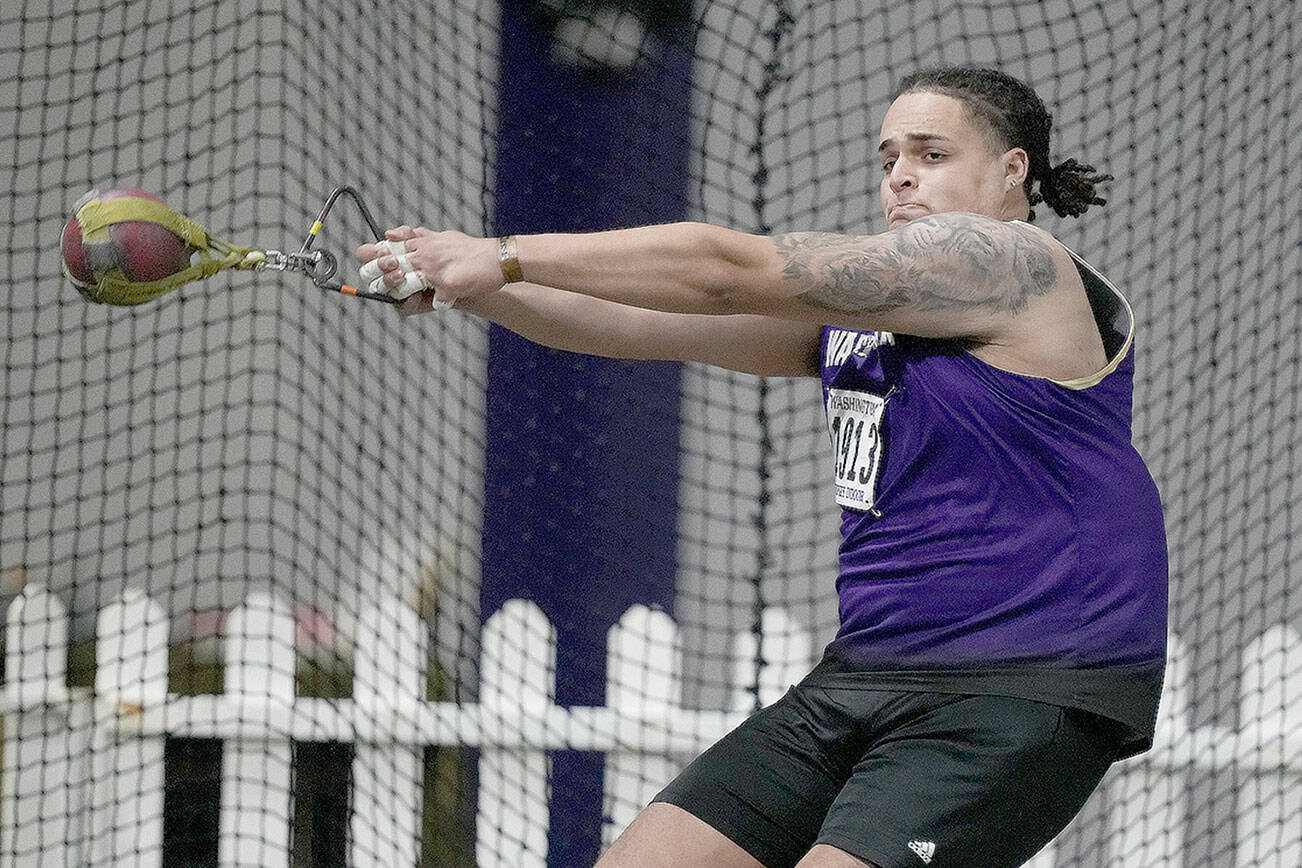 Washington’s Jayden White, an Everett High School alum, broke his own school record in the weight throw at the Husky Classic on Feb. 12, 2022, in Seattle. (Red Box Pictures)