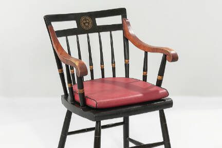 This midcentury Windsor style chair features the crest and colors of Harvard University. It sold for $438, more than twice its estimate, at a Bonhams Skinner auction.