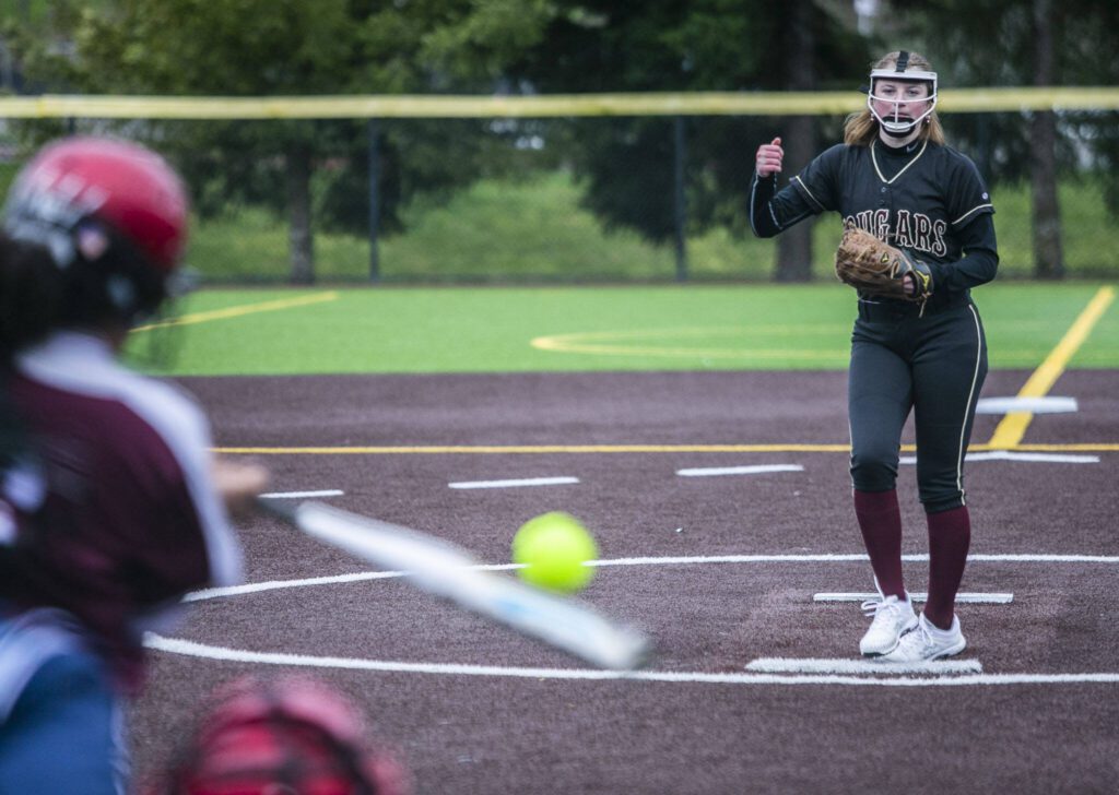 Lakewood’s Katie Krueger pitches to Cascade’s Jaidyn Wilson during a game on March 13, 2023, in Everett. (Olivia Vanni / The Herald)
