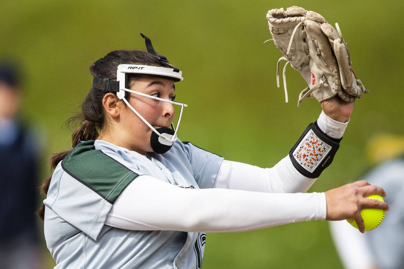 Jackson’s Yanina Sherwood pitches during the game against Glacier Peak on Thursday, April 28, 2022 in Everett, Washington. (Olivia Vanni / The Herald)