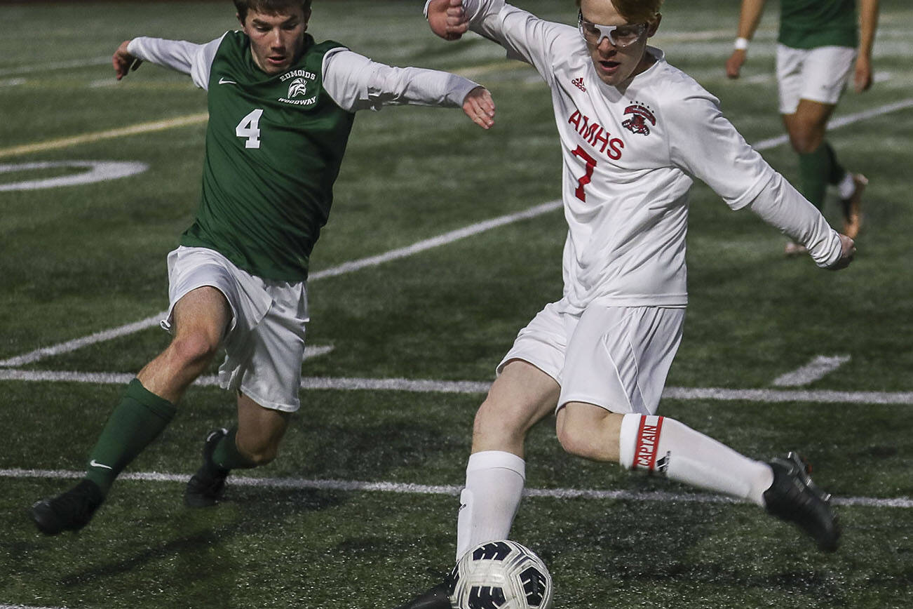 Archbishop Murphy’s Sean Balen (7) kicks the ball during a boys soccer match between Archbishop Murphy and Edmonds-Woodway at Edmonds-Wooday High School in Edmonds, Washington on Tuesday, March 28, 2023. Edmonds-Woodway won, 4-1. (Annie Barker / The Herald)