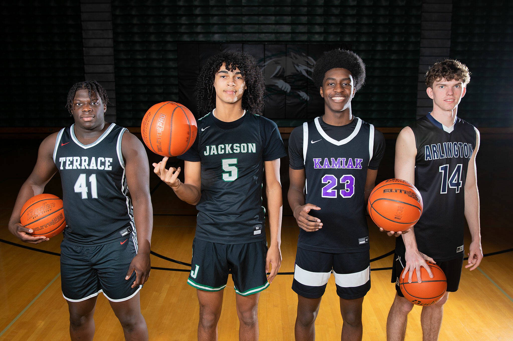 The Herald’s 2022-23 All-Area boys basketball first-team, pictured from left: Mountlake Terrace’s Zaveon Jones, Jackson’s Sylas Williams, Kamiak’s Josiah Pierre and Arlington’s David Zachman of Arlington. Not pictured: Shorecrest’s Parker Baumann and Mariner’s Makai Bloomfield. (Ryan Berry / The Herald)