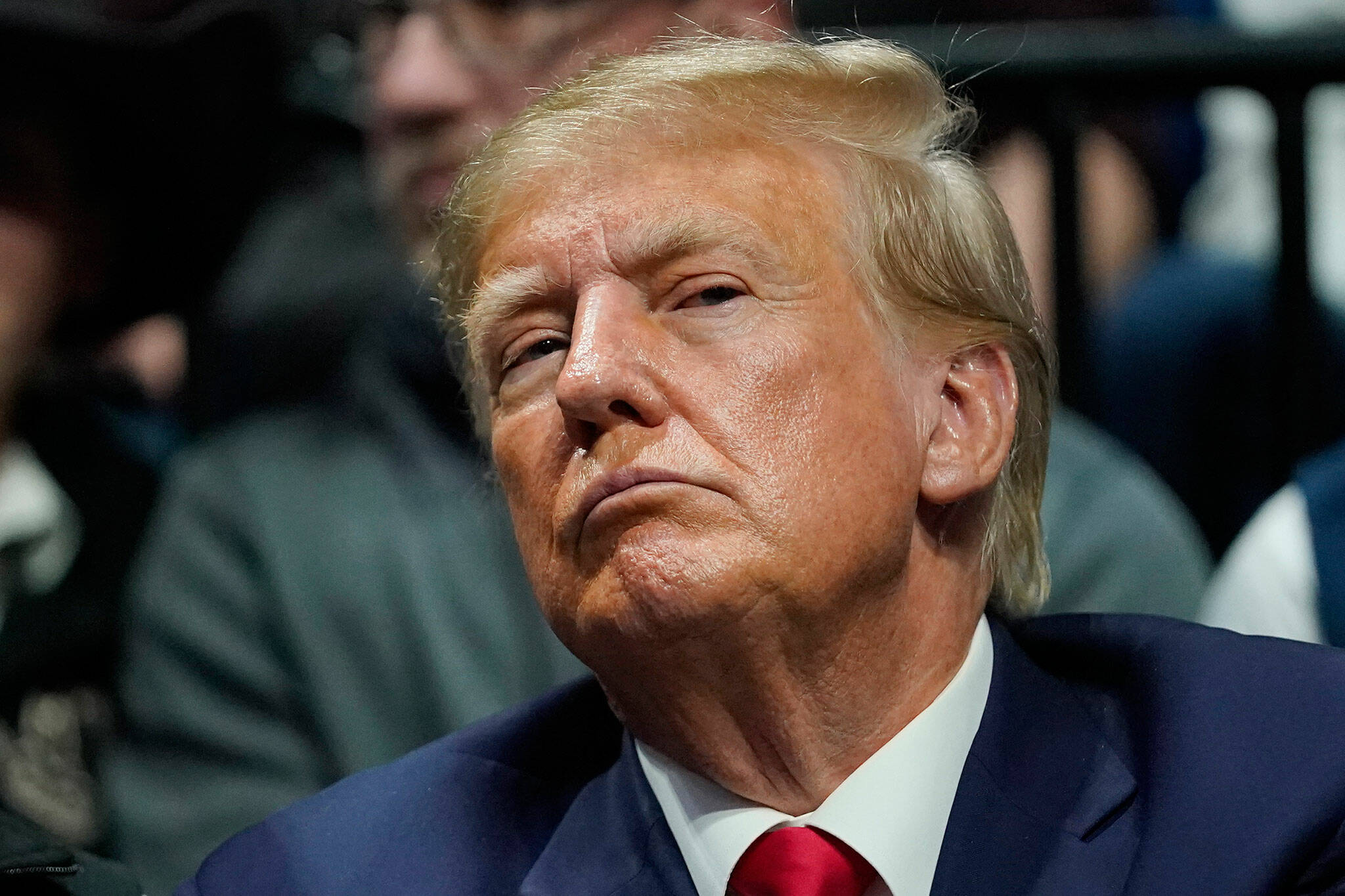 Former President Donald J. Trump watches the NCAA Wrestling Championships, Saturday, March 18, 2023, in Tulsa, Okla. (AP Photo / Sue Ogrocki, File)