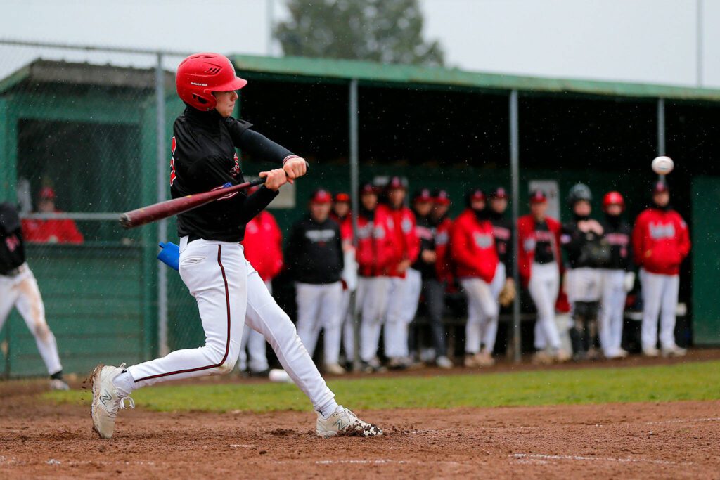 A Snohomish batter takes a cut against Glacier Peak on Friday, March 31, 2023, at Earl Torgeson Field in Snohomish, Washington. (Ryan Berry / The Herald)
