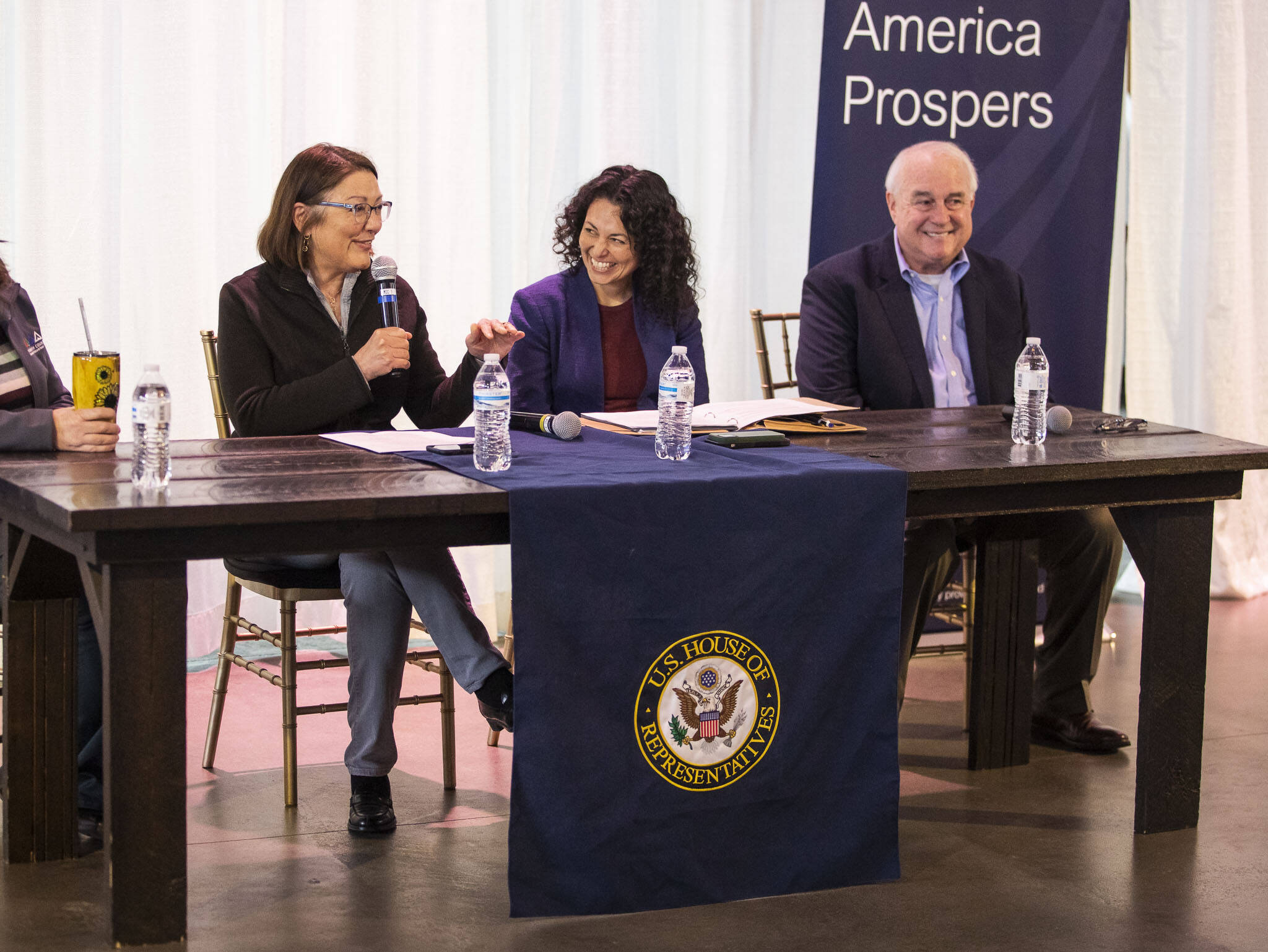 Rep. Suzan DelBene, left, introduces Xochitl Torres Small, center, Undersecretary for Rural Development with the U.S. Department of Agriculture during a talk at Thomas Family Farms on Monday, April 3, 2023 in Snohomish, Washington. (Olivia Vanni / The Herald)