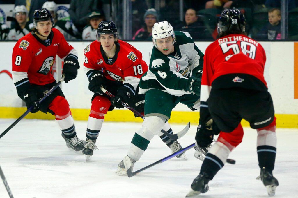 Everett Silvertips’ defender Ty Gibson tries to get off a shot in traffic during game three of a playoff series against the Portland Winterhawks on Monday, April 3, 2023, at Angel of the Winds Arena in Everett, Washington. (Ryan Berry / The Herald)
