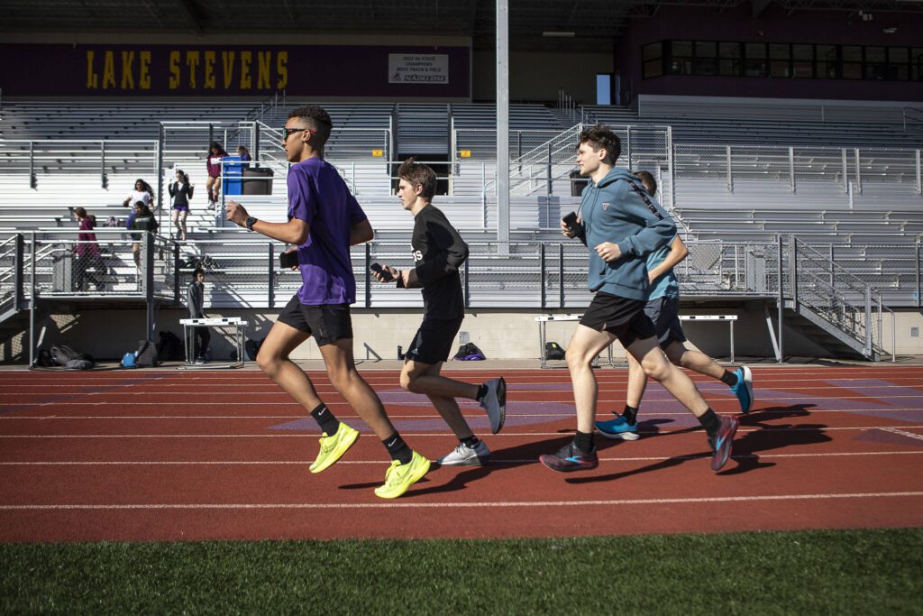 Track and field athletes practice after school at Lake Stevens High School in Lake Stevens, Washington on Wednesday, March 22, 2023. The team has over 300 members. (Annie Barker / The Herald)
