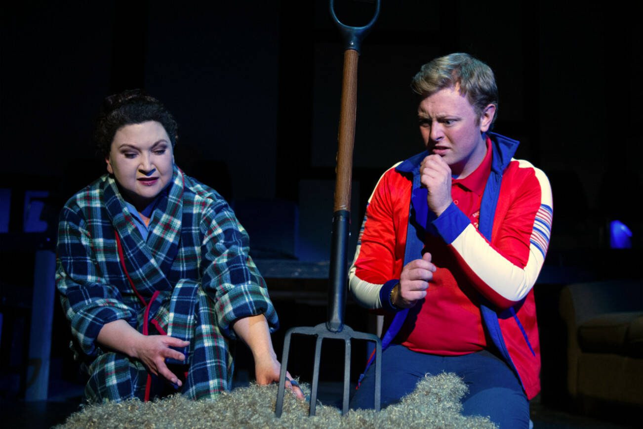 Christopher (Jordan Mielbrecht) and his neighbor (Ingrid Sanai Buron) discover her dog Wellington has been murdered in Red Curtain’s production of “The Curious Incident of the Dog in the Night-Time,” running April 14-30 in Marysville. (Kenny Randall)
