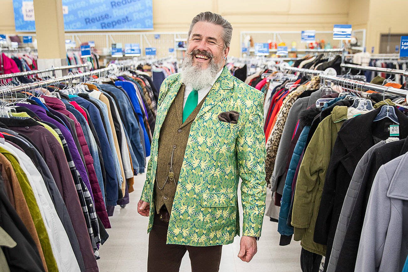 Tim Lambright, also known as SpiffyThriftyMan in Instagram, inside Value Village, one of the many thrift stores he frequents on Wednesday, April 5, 2023 in Everett, Washington. (Olivia Vanni / The Herald)