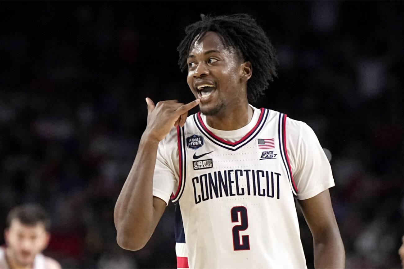 Connecticut guard Tristen Newton celebrates after scoring against San Diego State during the first half of the men's national championship college basketball game in the NCAA Tournament on Monday, April 3, 2023, in Houston. (AP Photo/Brynn Anderson)