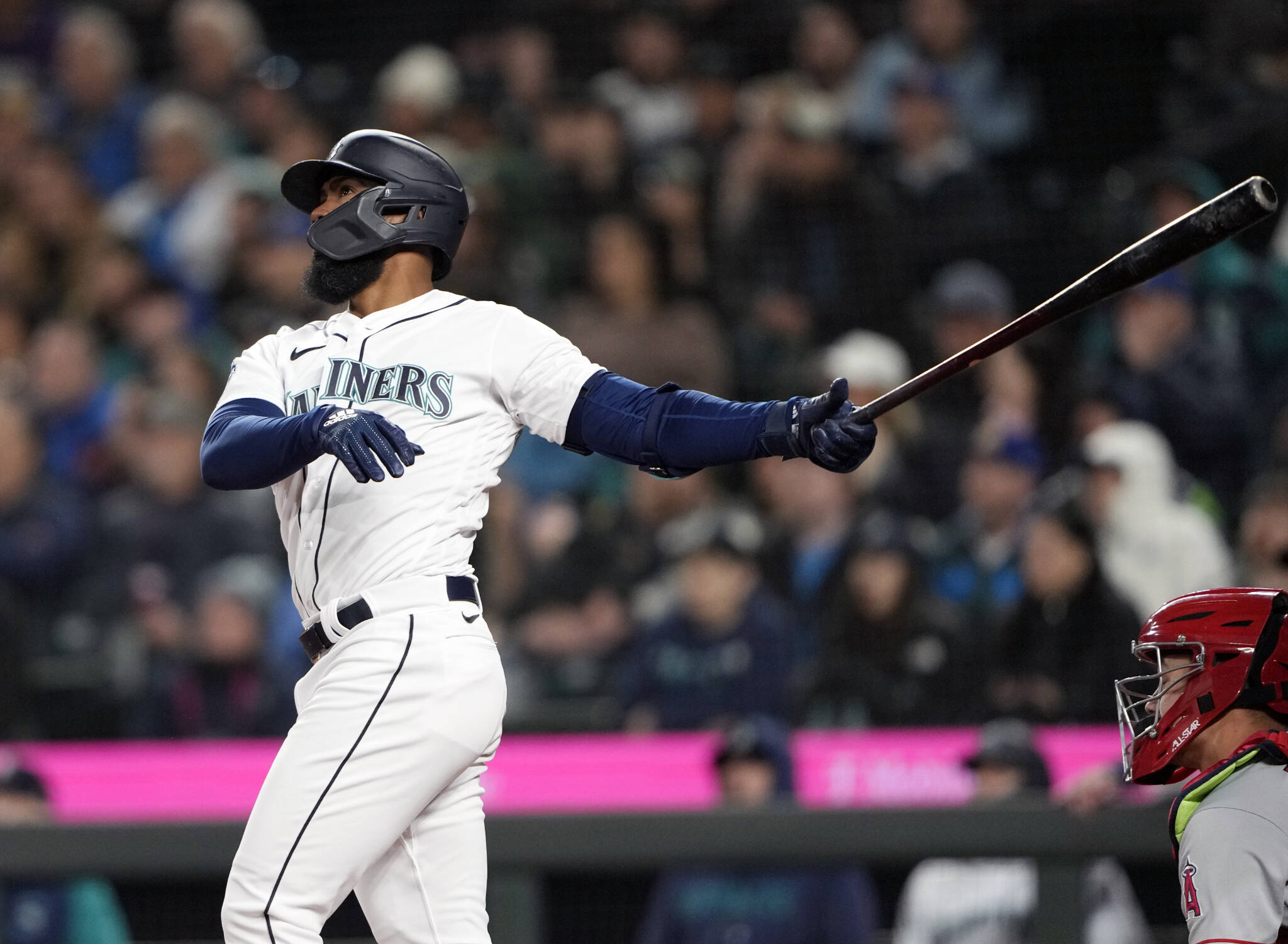 Seattle Mariners’ Teoscar Hernandez follows through on a three-run home run, his second home run of the game, against the Los Angeles Angels during the fifth inning Tuesday in Seattle. (AP Photo/Lindsey Wasson)