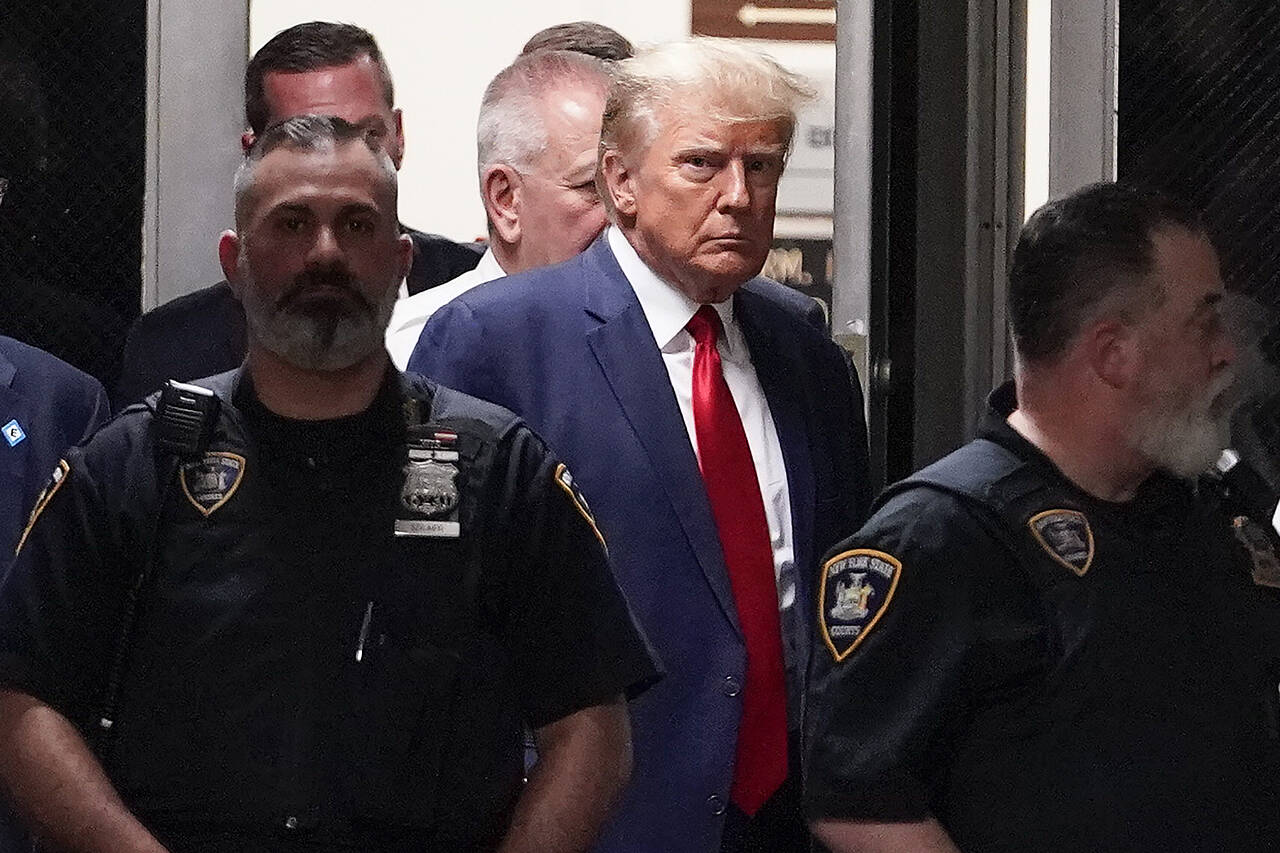 Former President Donald Trump arrives at court, Tuesday, in New York on charges related to falsifying business records in a hush money investigation. (Mary Altaffer / Associated Press)
