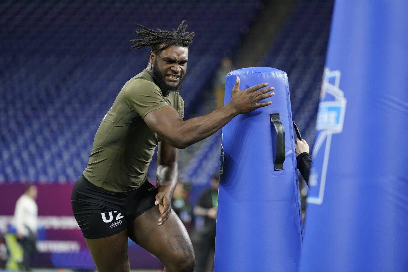 Alabama linebacker Will Anderson runs a drill at the NFL football scouting combine in Indianapolis, Thursday, March 2, 2023. (AP Photo/Michael Conroy)