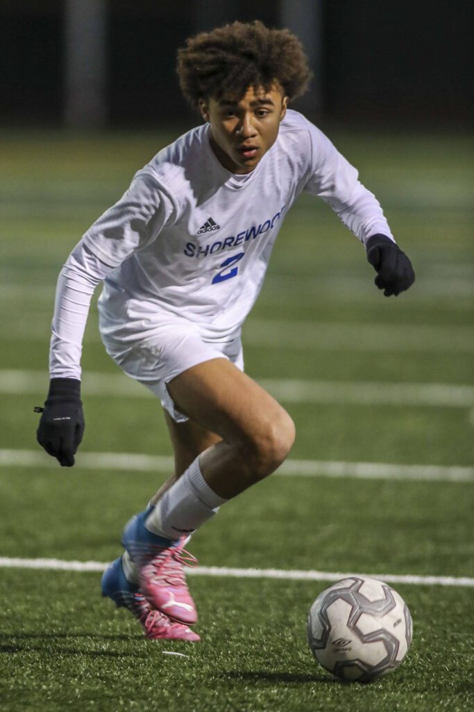 Shorewood’s Jackson Smith (2) moves with the ball during a game between Monroe and Shorewood at Monroe High School on Friday, April 7, 2023 in Monroe, Washington. Shorewood won in double overtime, 3-2. (Annie Barker / The Herald)
