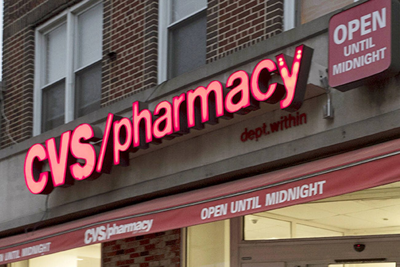 CVS Pharmacy, Sunday, Dec. 3, 2017 in the Brooklyn borough of New York. CVS will buy insurance giant Aetna in a roughly $69 billion deal that will help the drugstore chain reach deeper into customer health care and protect a key client, a person with knowledge of the matter said Sunday. (AP Photo/Mark Lennihan)