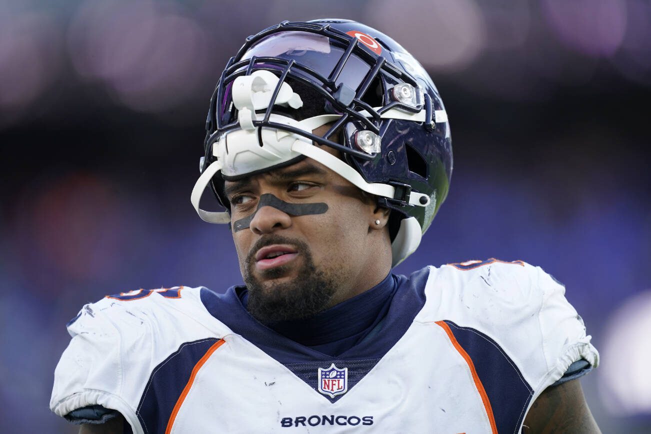 Denver Broncos defensive end Dre'Mont Jones stands on the sideline in the second half of an NFL football game against the Baltimore Ravens, Sunday, Dec. 4, 2022, in Baltimore. (AP Photo/Patrick Semansky)