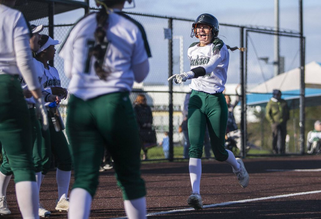 Macie Dean runs into home to score a run during the game against Kamiak on Tuesday, April 11, 2023 in Everett, Washington. (Olivia Vanni / The Herald)
