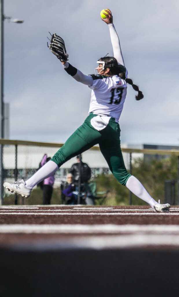Yanina Sherwood winds up to pitch during the game against Kamiak on Tuesday, April 11, 2023 in Everett, Washington. (Olivia Vanni / The Herald)
