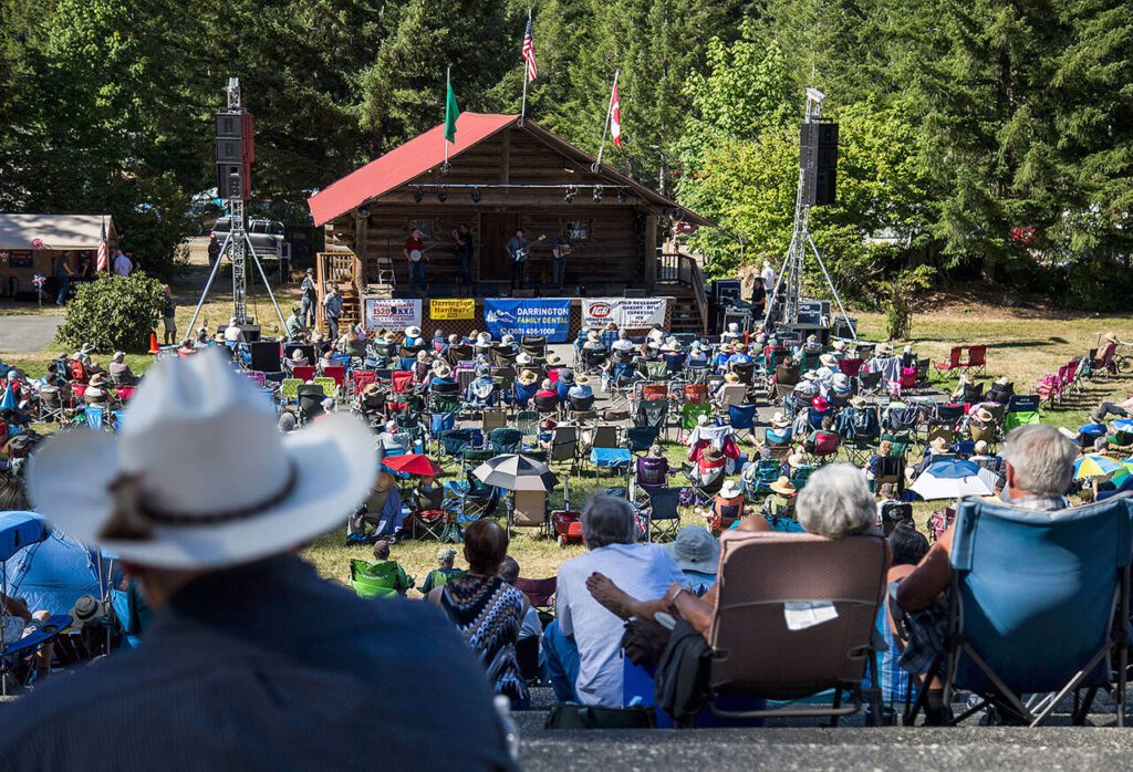Hundreds gather at the 2018 Darrington Bluegrass Festival on Saturday, July 21, 2018 in Darrington, Washington. (Olivia Vanni / Herald file)
