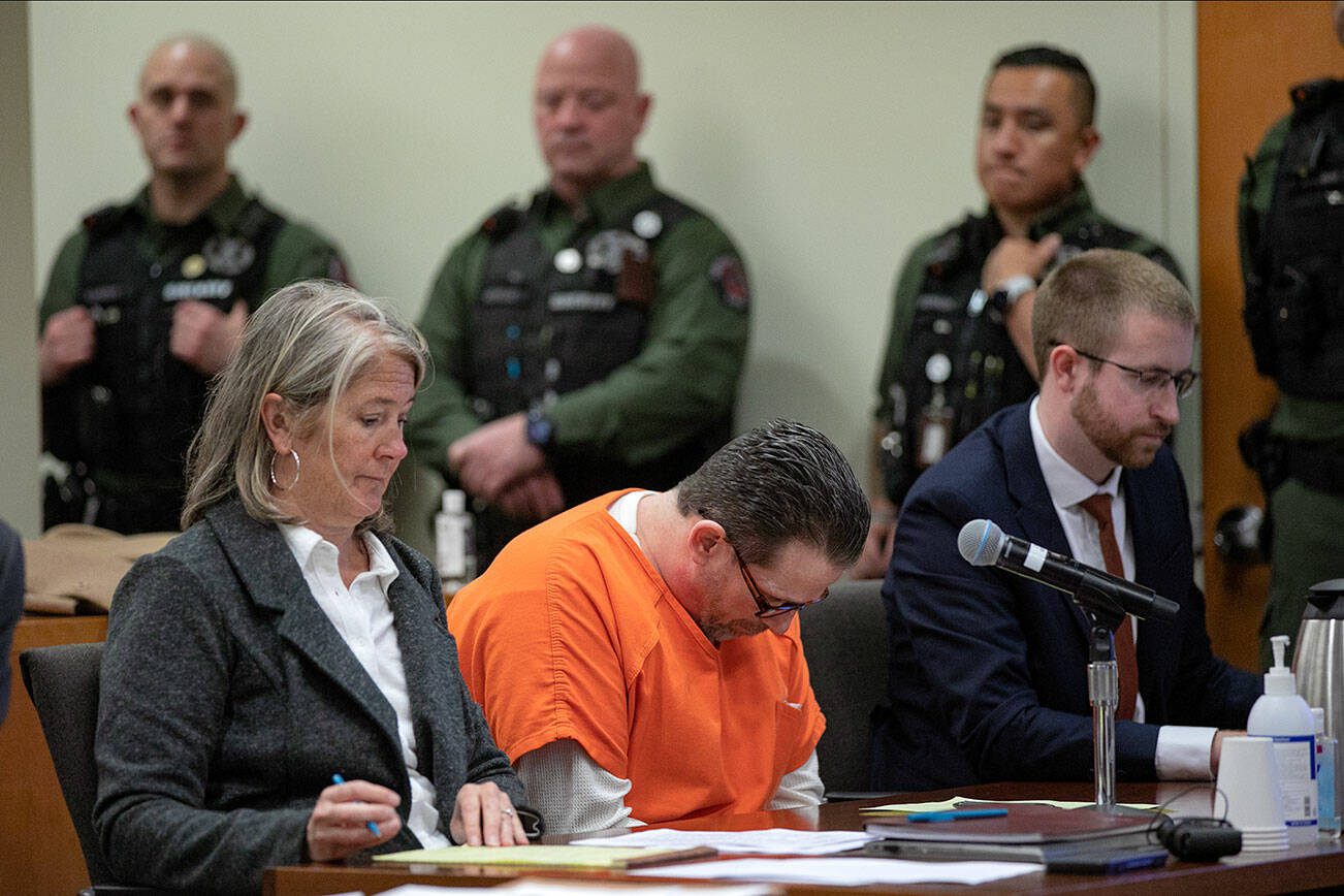 Richard Rotter, convicted in the murder of Everett Police officer Dan Rocha, hangs his head while family of Rocha speak in court on Monday, April 17, 2023, at Snohomish County Superior Court in Everett, Washington. (Ryan Berry / The Herald)